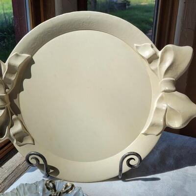 Lot 49: Ivory Italian Platter with Bows and unmarked China Plates and Bow Napkin Rings