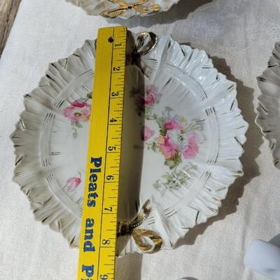 Lot 49: Ivory Italian Platter with Bows and unmarked China Plates and Bow Napkin Rings