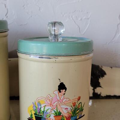 Lot 66: Vintage Lady Gardening Cannister Set