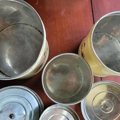 Lot 66: Vintage Lady Gardening Cannister Set