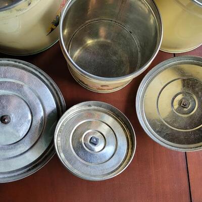 Lot 66: Vintage Lady Gardening Cannister Set