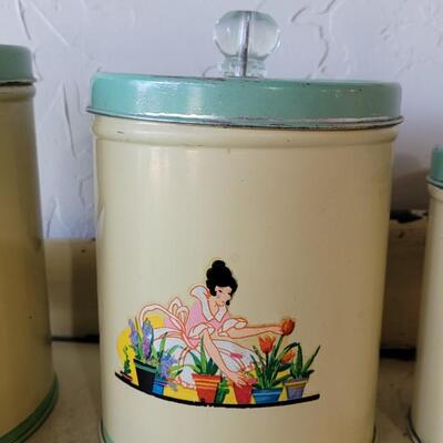 Lot 66: Vintage Lady Gardening Cannister Set