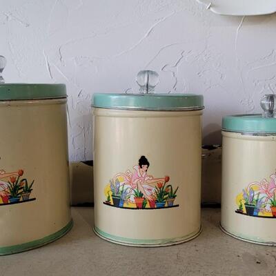 Lot 66: Vintage Lady Gardening Cannister Set