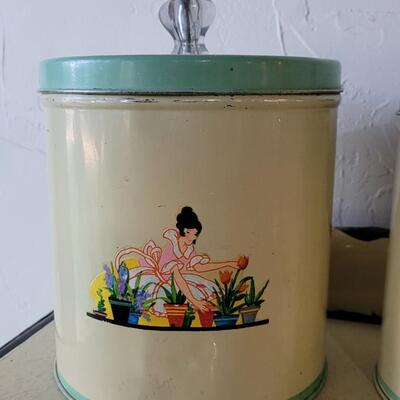 Lot 66: Vintage Lady Gardening Cannister Set
