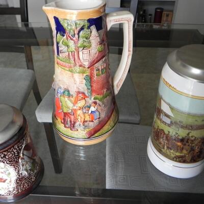 LOT  228 THREE COLLECTIBLE STEINS
