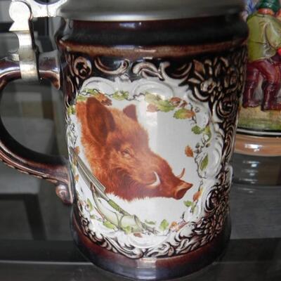 LOT  228 THREE COLLECTIBLE STEINS