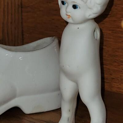 Lot 101: Antique Porcelain Doll Body & White Shoe