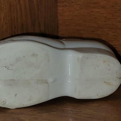 Lot 101: Antique Porcelain Doll Body & White Shoe