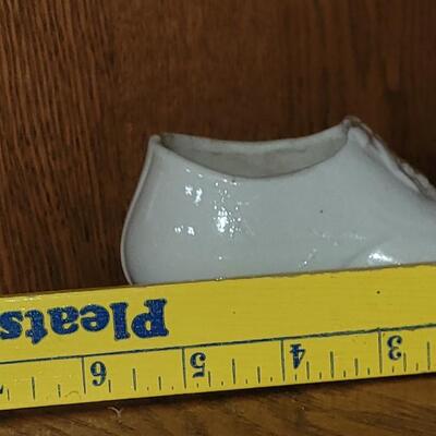 Lot 101: Antique Porcelain Doll Body & White Shoe
