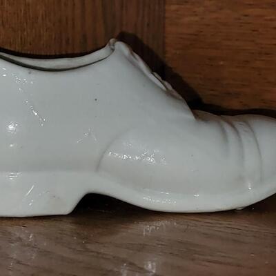 Lot 101: Antique Porcelain Doll Body & White Shoe