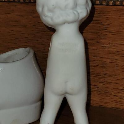 Lot 101: Antique Porcelain Doll Body & White Shoe