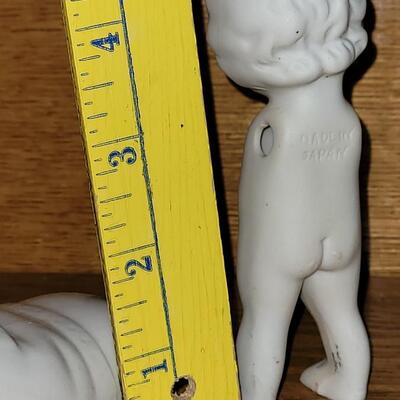 Lot 101: Antique Porcelain Doll Body & White Shoe