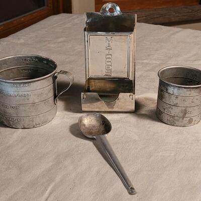 Lot 120: Antique Measuring Cups, Spoon & Match Holder