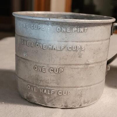 Lot 120: Antique Measuring Cups, Spoon & Match Holder