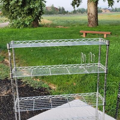 Lot 143: 24" x 27" Stainless Metal Shelf