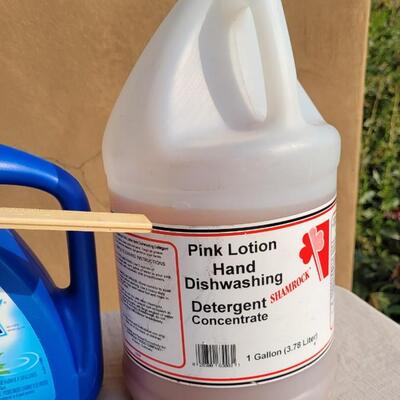 Lot 169: PUREX Laundry Detergent and PINK Hand Soap Concentrate (See Ruler Spot for Level)