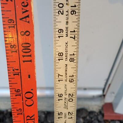 Lot 211: Assortment of (4) Vintage Yard Sticks