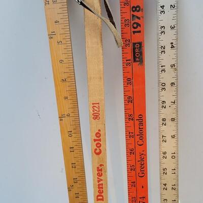 Lot 211: Assortment of (4) Vintage Yard Sticks