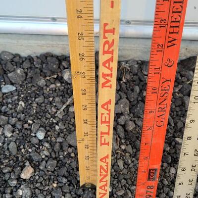 Lot 211: Assortment of (4) Vintage Yard Sticks