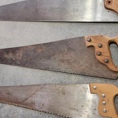 Lot 214: (3) Vintage Hand Saws