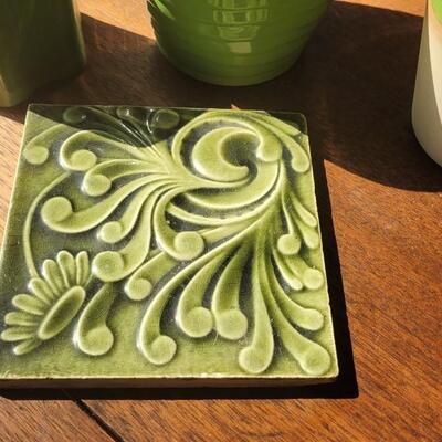 Lot 228: Green Pottery and Tile Trivet 