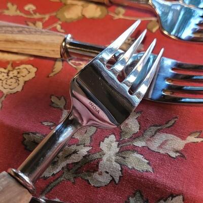 Lot 242: Wood Handle Flatware made in India 