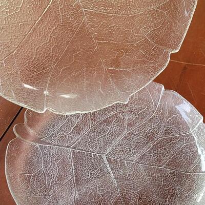 Lot 251: (2) Clear Cabbage Leaf Plates and (4) Clear Textured Plates