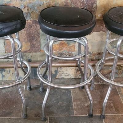 Lot 256: (3) Black Vinyl & Chrome Bar Stools (Seats have Spilt Vinyl