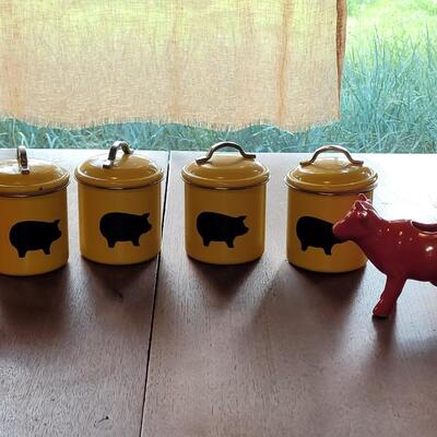 Lot 279: (4) Yellow Cannisters with Pigs, Red Cow Creamer and Red Pig Mug