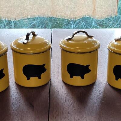 Lot 279: (4) Yellow Cannisters with Pigs, Red Cow Creamer and Red Pig Mug