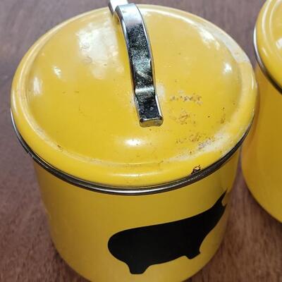 Lot 279: (4) Yellow Cannisters with Pigs, Red Cow Creamer and Red Pig Mug