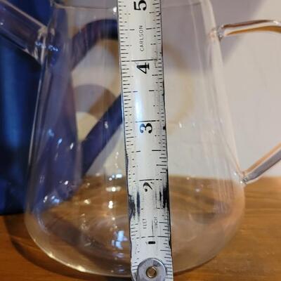 Lot 291: (2) Plastic Blue Water Cans & Glass Pitcher