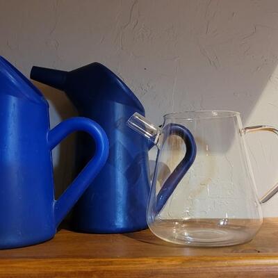 Lot 291: (2) Plastic Blue Water Cans & Glass Pitcher