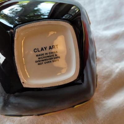 Lot 304: Clay Art and Chili Pepper Dishes, 2 unmarked Black Plates & Bowl  & 3 Napkins