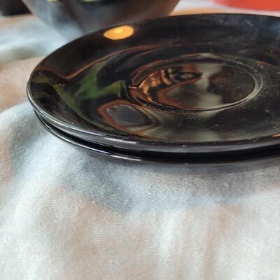 Lot 304: Clay Art and Chili Pepper Dishes, 2 unmarked Black Plates & Bowl  & 3 Napkins