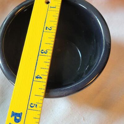 Lot 304: Clay Art and Chili Pepper Dishes, 2 unmarked Black Plates & Bowl  & 3 Napkins