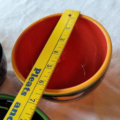 Lot 304: Clay Art and Chili Pepper Dishes, 2 unmarked Black Plates & Bowl  & 3 Napkins