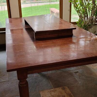 Lot 360: Cherry Wood Dining Table (has 3 total Leaves)