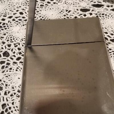 Lot 392: Kitchen Cheese Slicer and Handi Magic Hand Mill
