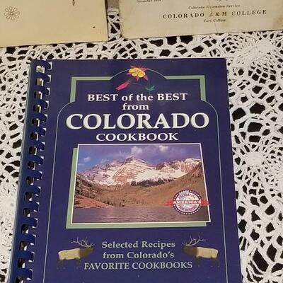 Lot 413: Colorado High Altitude Cookbooks - one has Handwritten recipes inside as well