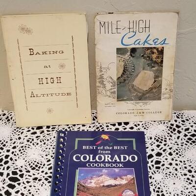 Lot 413: Colorado High Altitude Cookbooks - one has Handwritten recipes inside as well