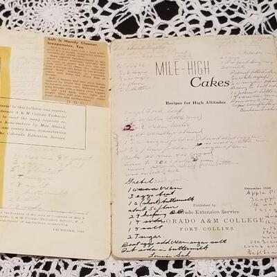 Lot 413: Colorado High Altitude Cookbooks - one has Handwritten recipes inside as well