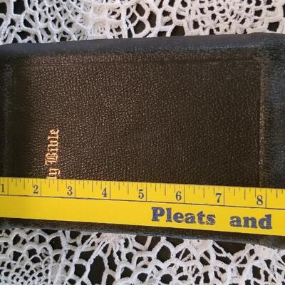 Lot 432: Antique Universal HOLY BIBLE with Gold Edge Pages and Soft Leather Cover