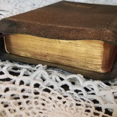 Lot 432: Antique Universal HOLY BIBLE with Gold Edge Pages and Soft Leather Cover