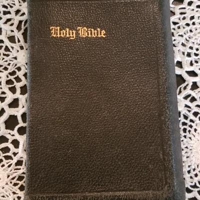 Lot 432: Antique Universal HOLY BIBLE with Gold Edge Pages and Soft Leather Cover