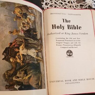Lot 432: Antique Universal HOLY BIBLE with Gold Edge Pages and Soft Leather Cover
