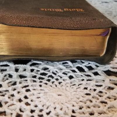 Lot 432: Antique Universal HOLY BIBLE with Gold Edge Pages and Soft Leather Cover