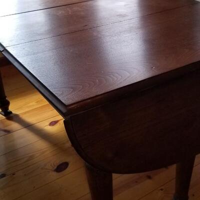 Lot 494: Vintage Dining Table with 3 Leaves - there are 2 on the table in the photo