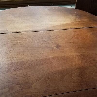 Lot 494: Vintage Dining Table with 3 Leaves - there are 2 on the table in the photo