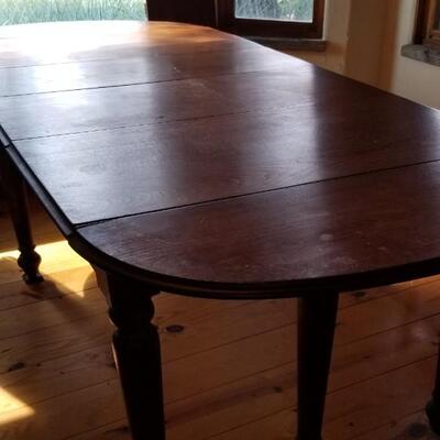 Lot 494: Vintage Dining Table with 3 Leaves - there are 2 on the table in the photo